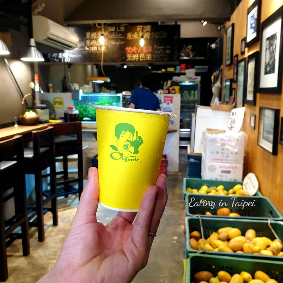 The shop is small and narrow inside, with a walkway down the middle, seating on the left, and crates of delicious limes along the right side